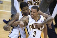 Indiana Pacers' George Hill (3) receives congratulations from Paul George after Hill hit a 3-point shot during the second half of the second game of an NBA first-round playoff basketball series against the Orlando Magic, Monday, April 30, 2012, in Indianapolis. (AP Photo/Darron Cummings)