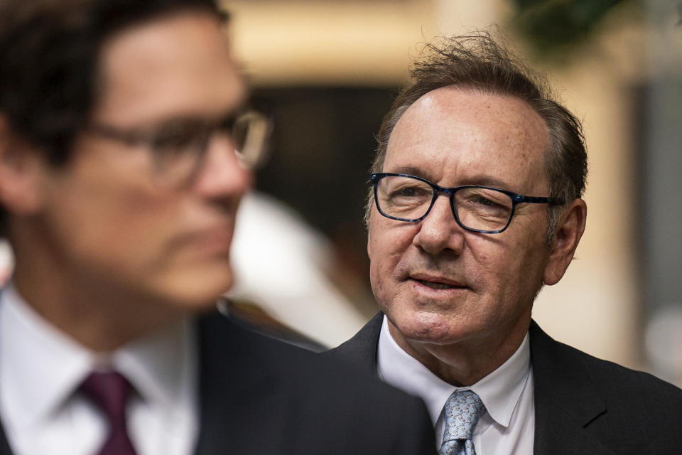 Actor Kevin Spacey looks on as he arrives at Southwark Crown Court, London, where he is charged with three counts of indecent assault, seven counts of sexual assault, one count of causing a person to engage in sexual activity without consent and one count of causing a person to engage in penetrative sexual activity without consent between 2001 and 2005, on Thursday July 13, 2023. (Aaron Chown/PA via AP)