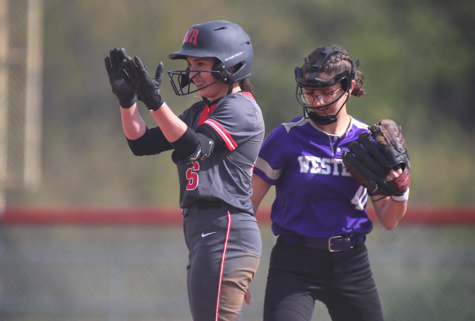West Allegheny's Aubrey Police (26) celebrates after hitting a double during the first inning against Western Beaver Wednesday evening at West Allegheny High School.