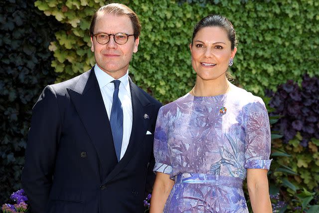 <p>Brendon Thorne/Getty Images</p> Crown Princess Victoria of Sweden with her husband Prince Daniel in Australia in February