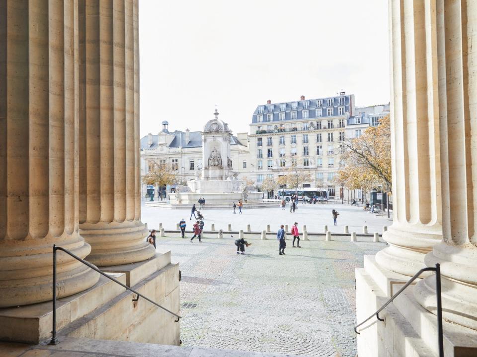 The view looking out from a building onto a plaza at Saint-Germain-des-Prés in Paris.