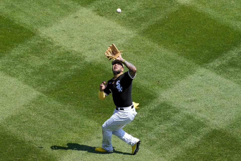 Chicago White Sox third baseman Yoan Moncada catches a fly ball by Kansas City Royals' Vinnie Pasquantino during the sixth inning of a baseball game in Chicago, Saturday, May 20, 2023. (AP Photo/Nam Y. Huh)