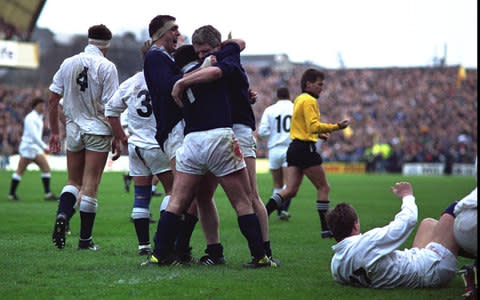 Chris Gray, David Sole and Finlay Calder of Scotland celebrate during the 1990 Five Nations Championship match between Scotland and England at Murrayfield in Edinburgh, Scotland. Scotland won the match 13-7 - Credit: Allsport