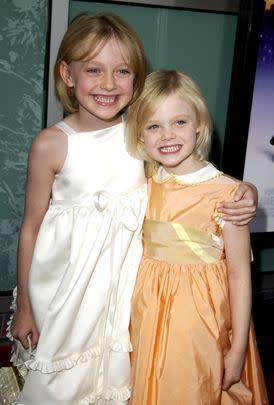 Elle Fanning grew up in the spotlight alongside her older sister Dakota Fanning and said that during the height of Dakota's fame as a child star she said it was wild to see her older sister get recognized on the street by fans. 