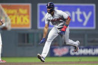 Cleveland Guardians' Amed Rosario celebrates after a home run against the Minnesota Twins during the seventh inning of a baseball game Wednesday, June 22, 2022, in Minneapolis. (AP Photo/Andy Clayton-King)