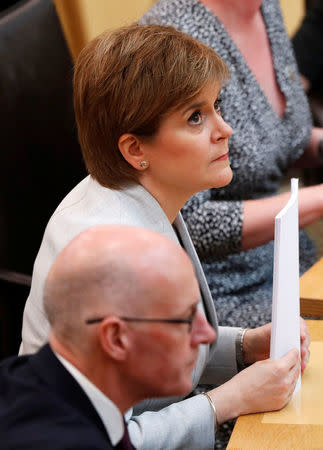 Scotland's First Minister Nicola Sturgeon prepares to speak at Scotland's Parliament in Edinburgh, Britain, September 5, 2017. REUTERS/Russell Cheyne