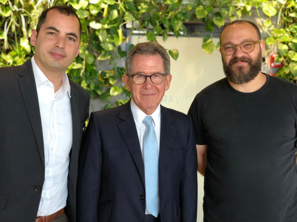 Founders Ami Daniel and Matan Peled with Lord Browne (centre) (Windward)