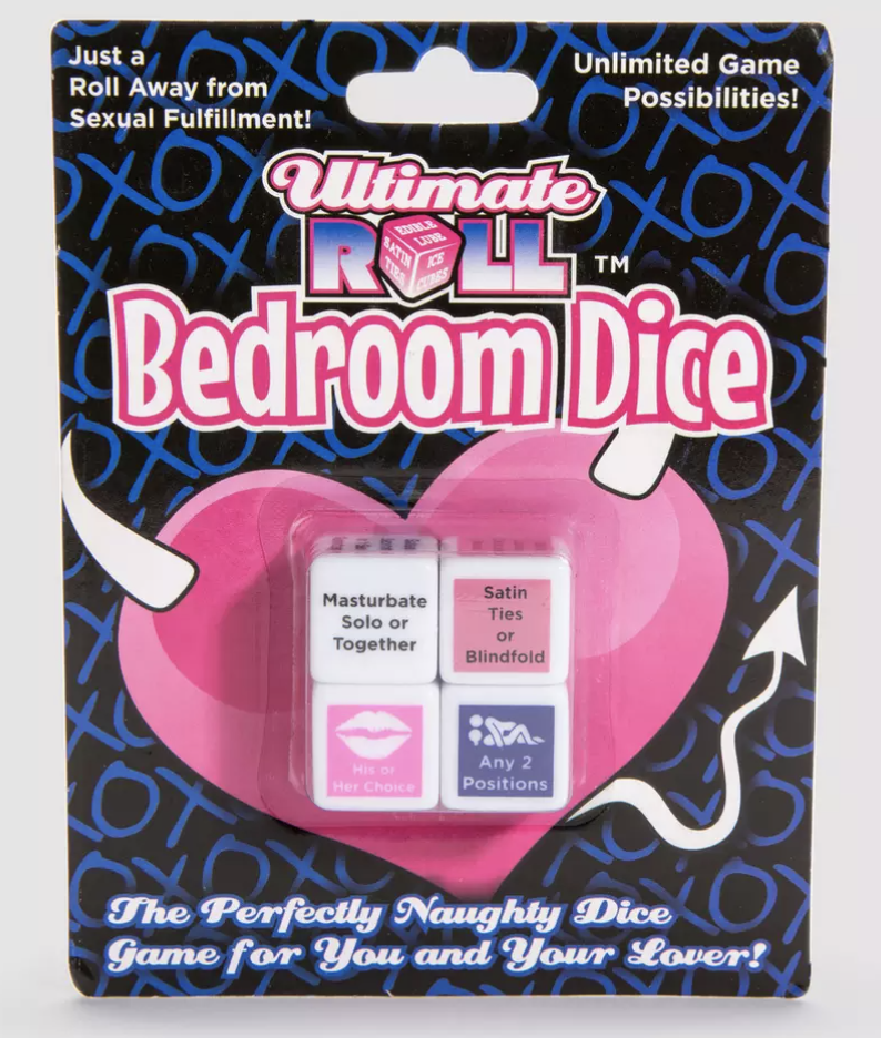 A packaged set of Ultimate Roll Bedroom Sex Dice in blue, black, pink and white cardboard. The dice are white with sexual suggestions on each face in coloured writing.