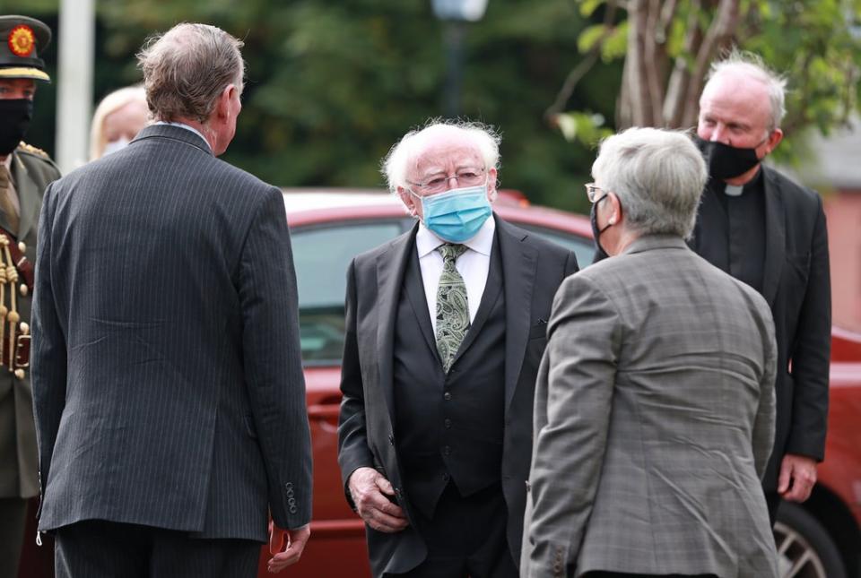 Michael D Higgins (centre), the President of Ireland, arrives for the funeral of Pat Hume (Liam McBurney/PA) (PA Wire)