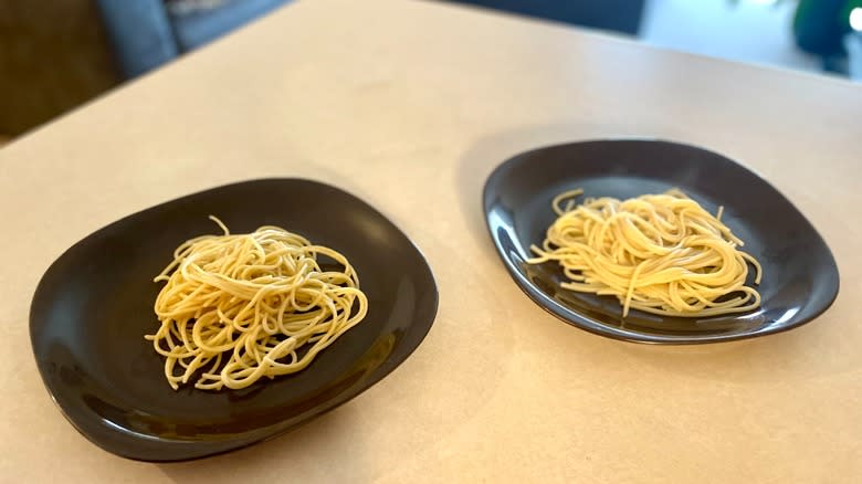 pasta noodles on two plates