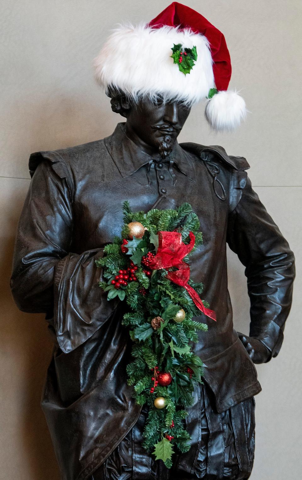 The statue of William Shakespeare is decorated for Christmas at the Alabama Shakespeare Festival in Montgomery, Ala., on Tuesday November 29, 2022. 