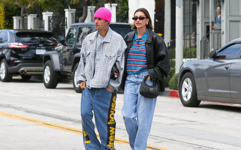 Hailey Bieber in a blue Loewe rugby top - GC Images/Justin Bieber and Hailey Bieber are seen on March 13, 2023 in Los Angeles