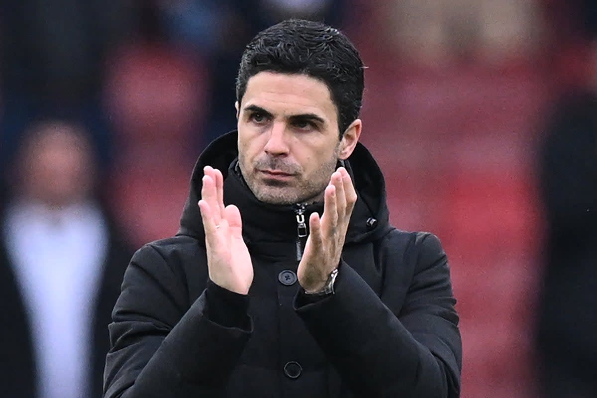 Happy manager: Mikel Arteta’s side made it seven Premier League wins in a row  (AFP via Getty Images)