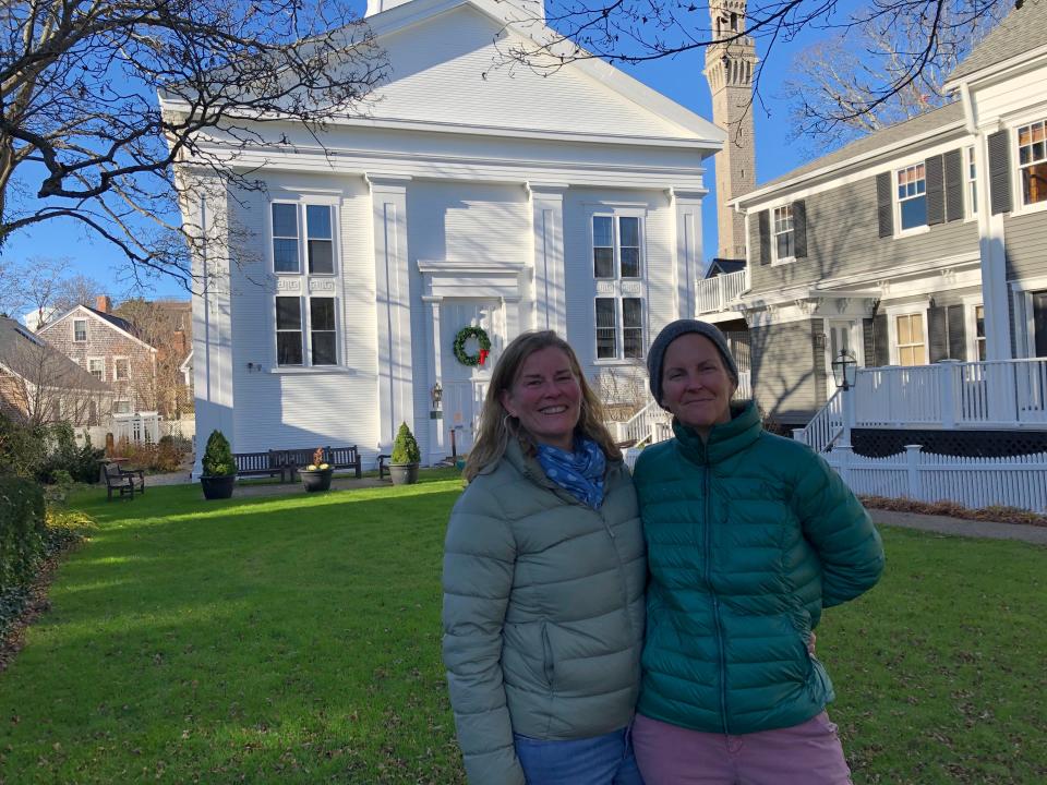 Laura Denman-Magden, left, and Lisa Magnarelli-Magden of Martha's Vineyard celebrate in Provincetown Friday after Congress passed the Respect for Marriage Act Thursday. The couple was married in 2005 and have three children