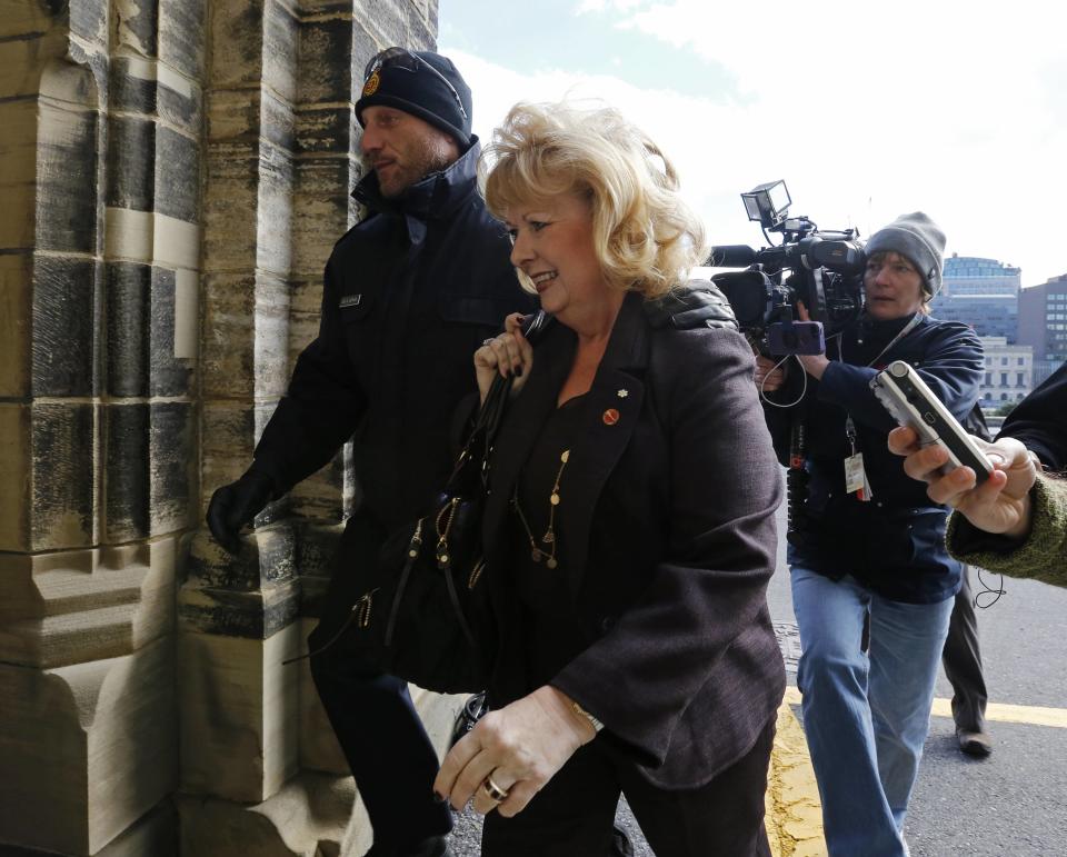 Senator Pamela Wallin arrives on Parliament Hill in Ottawa