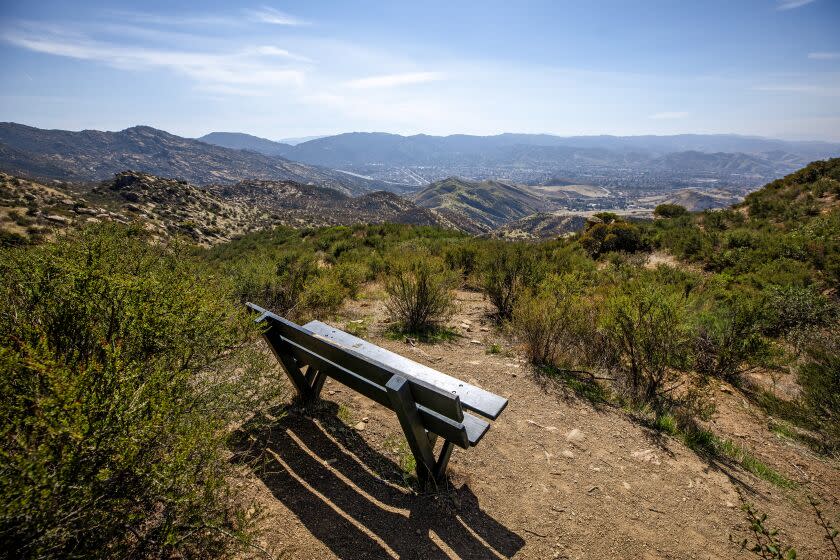 SIMI VALLEY, CA - FEBRUARY 11: A resting spot near the 1 1/4-mile marker on the Chumash Trail offers a view of Simi Valley. The trail leads to Rocky Peak which is the fourth-highest point in the Santa Susana Mountains, and overlooks the San Fernando Valley and Simi Valley. Photographed on Thursday, Feb. 11, 2021 in Simi Valley, CA. (Myung J. Chun / Los Angeles Times)