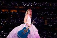 <p>Emma McIntyre/TAS23/Getty</p> Taylor Swift performs in August 2023 in Inglewood, California