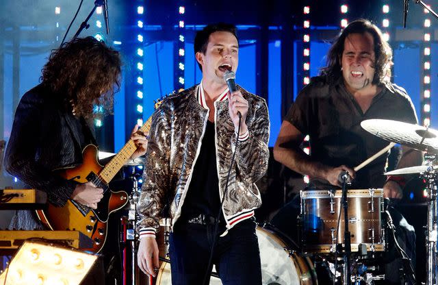 <p>Ethan Miller/Getty</p> The Killers