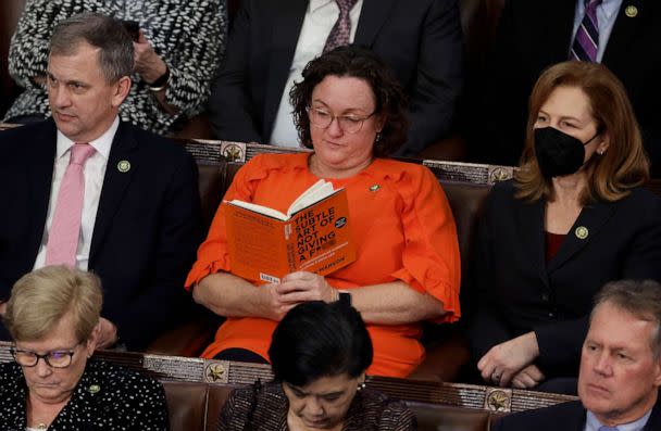 PHOTO: Rep. Katie Porter reads a book with a pointed title in the House Chamber during the fourth day of elections for Speaker of the House at the U.S. Capitol on Jan. 06, 2023 in Washington. (Anna Moneymaker/Getty Images)