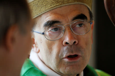 FILE PHOTO: French Archbishop Philippe Barbarin before a ceremony to consecrate the new parish of Saint-Philippe de Venissieux, near Lyon, France, September 30, 2018. REUTERS/Emmanuel Foudrot/File Photo