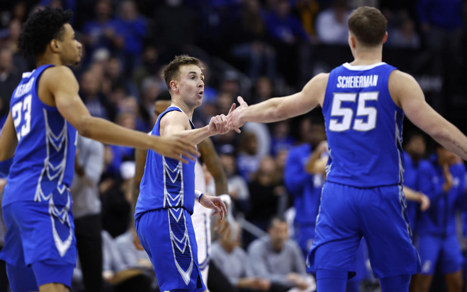 Creighton guard Steven Ashworth, center, celebrates with Baylor Scheierman (55) after scoring against Seton Hall during the second half of an NCAA college basketball game in Newark, N.J. Saturday, Jan. 20, 2024. Creighton won 97-94 in triple overtime. (AP Photo/Noah K. Murray)