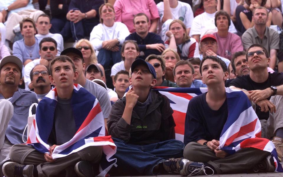 Crowds watching Henman at the 2001 tournament from Henman Hill - JULIAN SIMMONDS