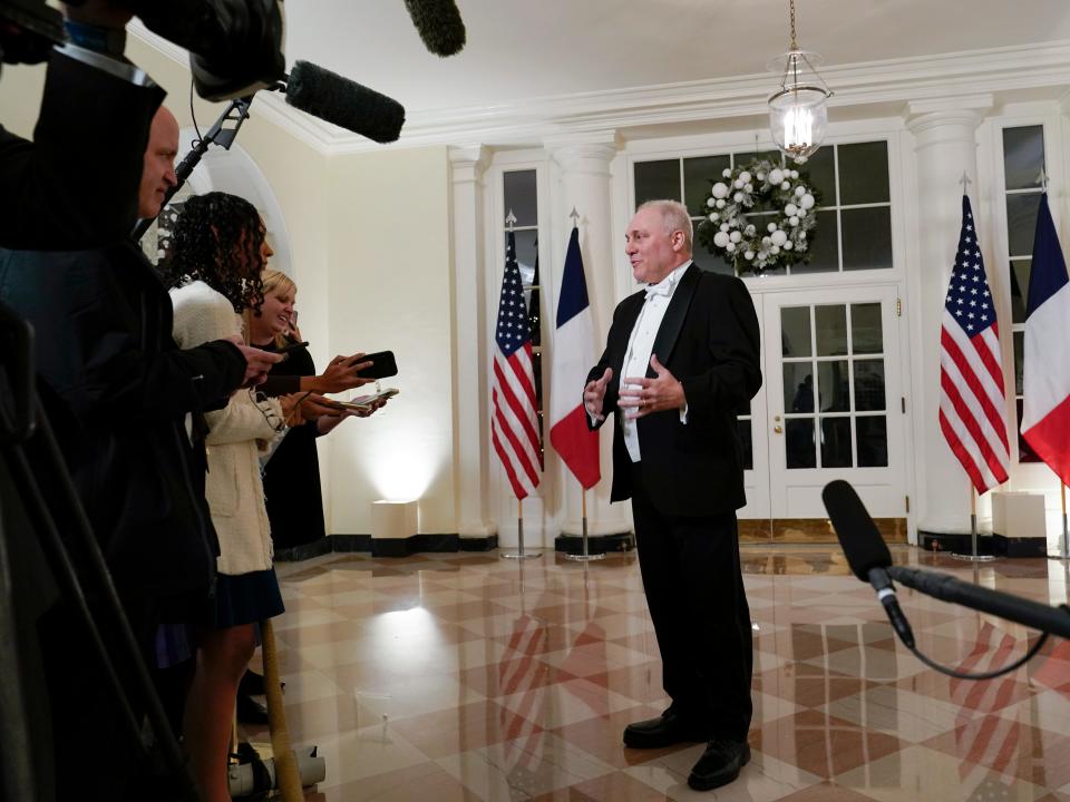 House Minority Whip Rep. Steve Scalise, R-La., speaks to members of the media as he arrives for the State Dinner with President Joe Biden and French President Emmanuel Macron at the White House in Washington, Thursday, Dec. 1, 2022.