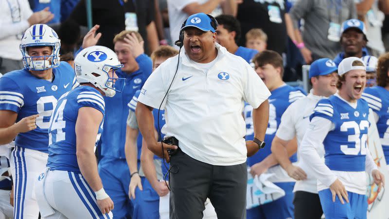 BYU Cougars head coach Kalani Sitake celebrates after an interception against the Texas Tech Red Raiders in Provo on Saturday, Oct. 21, 2023. BYU won 27-14.