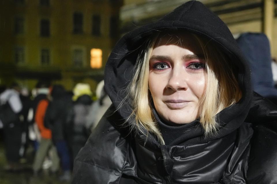 A woman who identified herself as Margarita speaks to The Associated Press in St. Petersburg, Russia, Tuesday, Jan. 23, 2024, after signing a petition for the candidacy of Boris Nadezhdin, a liberal Russian politician who is seeking to run in the March 17 presidential election. "I understood that these are the people who want to change the current government and I want to be a part of this," said Margarita, a 28-year-old student who declined to give her surname for fear of retribution. (AP Photo/Dmitri Lovetsky)