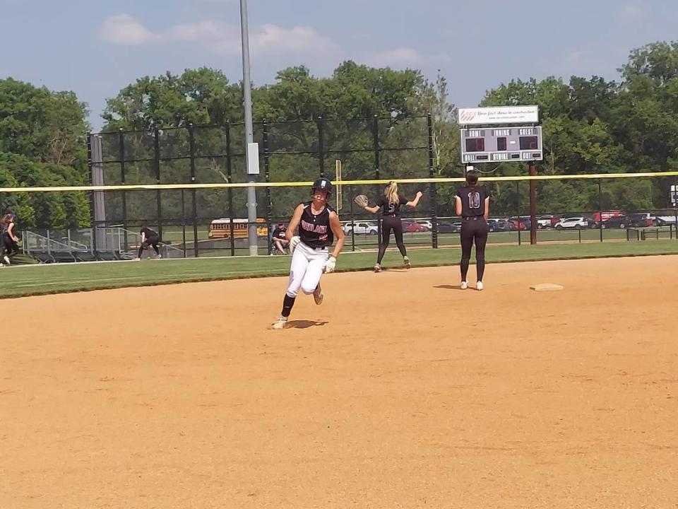 Highland senior infielder Maggie Grohmann rounds second base during the IHSA Class 3A Civic Memorial Regional semifinals against Mascoutah on Tuesday, May 23, at Bethalto Sports Complex. Grohmann helped power the Bulldogs to a 12-2 victory.