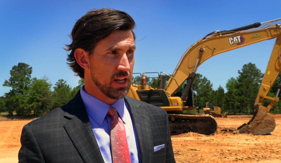 Shaun Culligan, Phenix City Economic Development Manager, speaks to the media after officials had a ceremonial groundbreaking Thursday for the expansion of the Daechang Seat Corp., USA manufacturing facility in Phenix City, Alabama. 05/12/2022