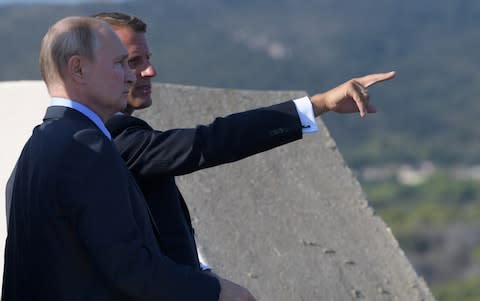 The two leaders met at Fort Bregancon near the village of Bormes-les-Mimosas - Credit: Sputnik/Alexei Druzhinin/Kremlin via REUTERS