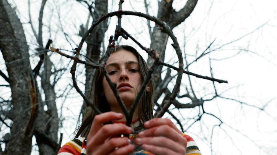 Zelda Adams plays a teenager isolated because of a sickness who learns about her family's dark history in the coming-of-age film "Hellbender."