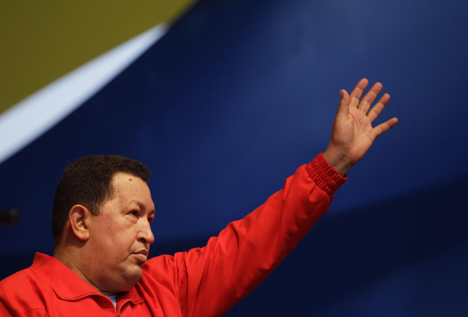 Venezuela's President Hugo Chavez waves to supporters during a campaign rally in the Antimano neighborhood of Caracas, Venezuela, Friday, Aug. 3, 2012. Venezuela's presidential election is scheduled for Oct. 7. (AP Photo/Ariana Cubillos)