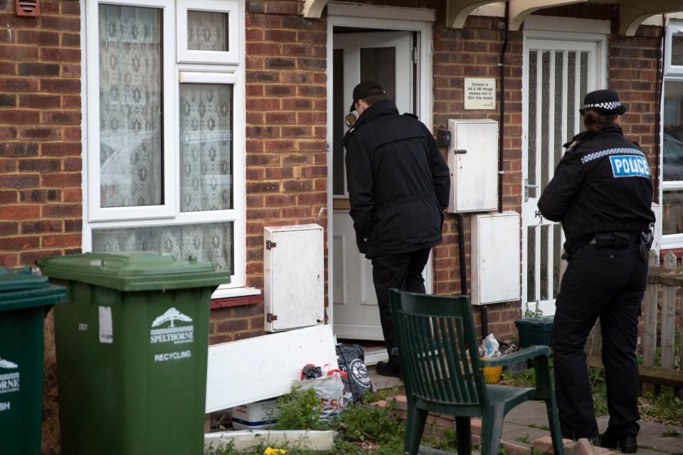 Police search a property in Viola Avenue, Stanwell, as investigations continued into a stabbing which is being treated as a terrorist incident (Steve Parsons/PA)