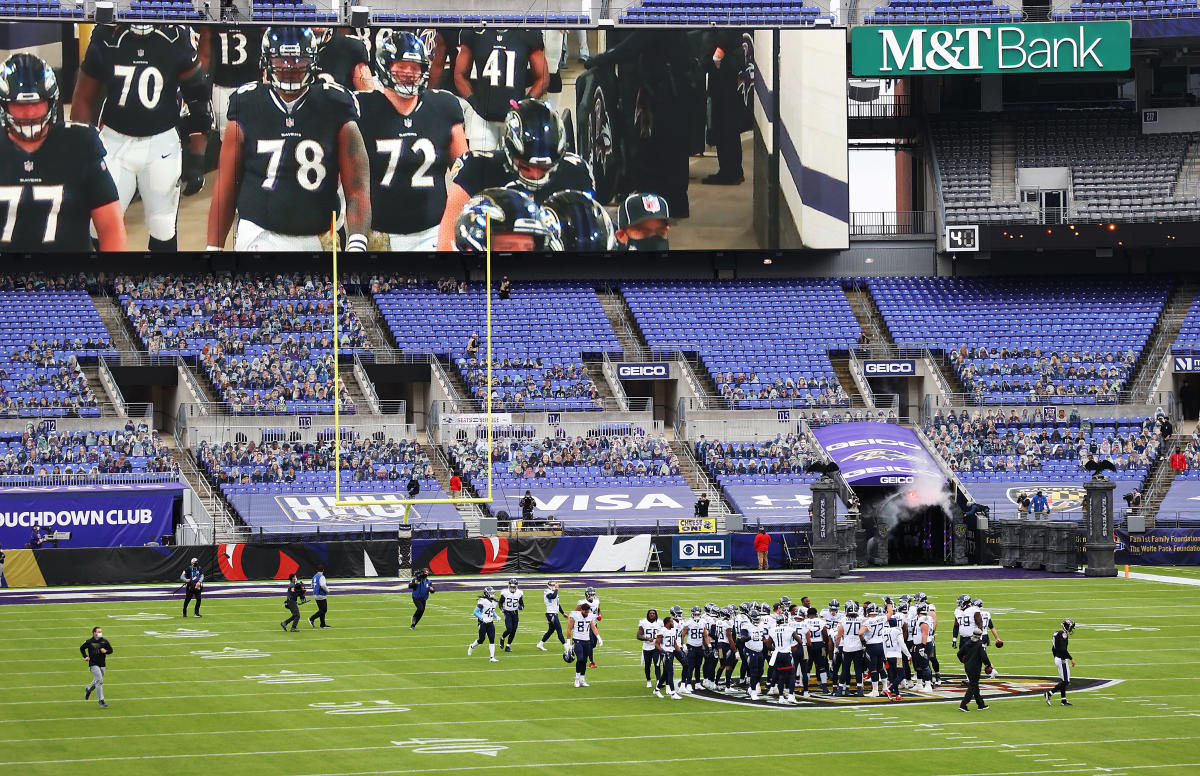 NFL Titans stomp on Ravens' logo before game, steal hearts during it