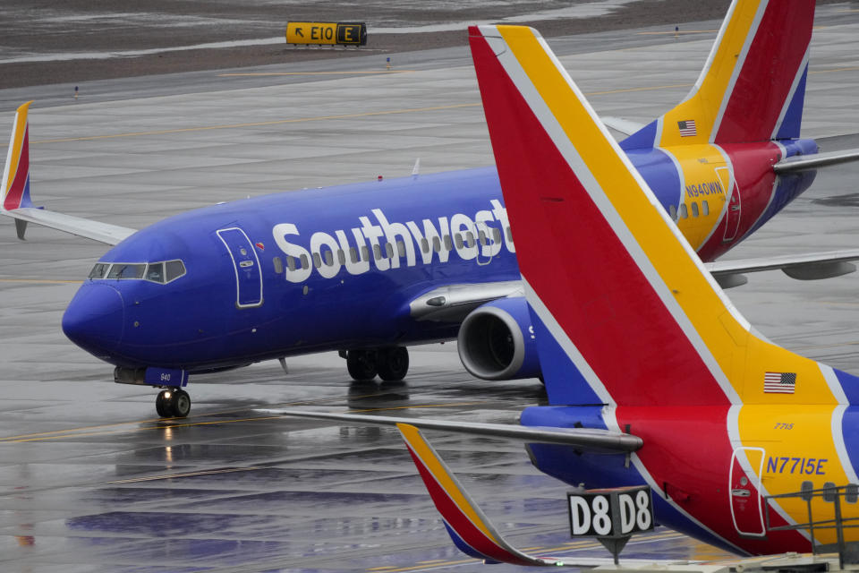 FILE - A Southwest Airlines jet arrives at Sky Harbor International Airport in Phoenix on Dec. 28, 2022. Southwest Airlines will pay a $35 million fine as part of a $140 million agreement to settle a federal investigation into a debacle last December when the airline canceled thousands of flights and stranded more than 2 million travelers over the holidays. (AP Photo/Matt York, File)