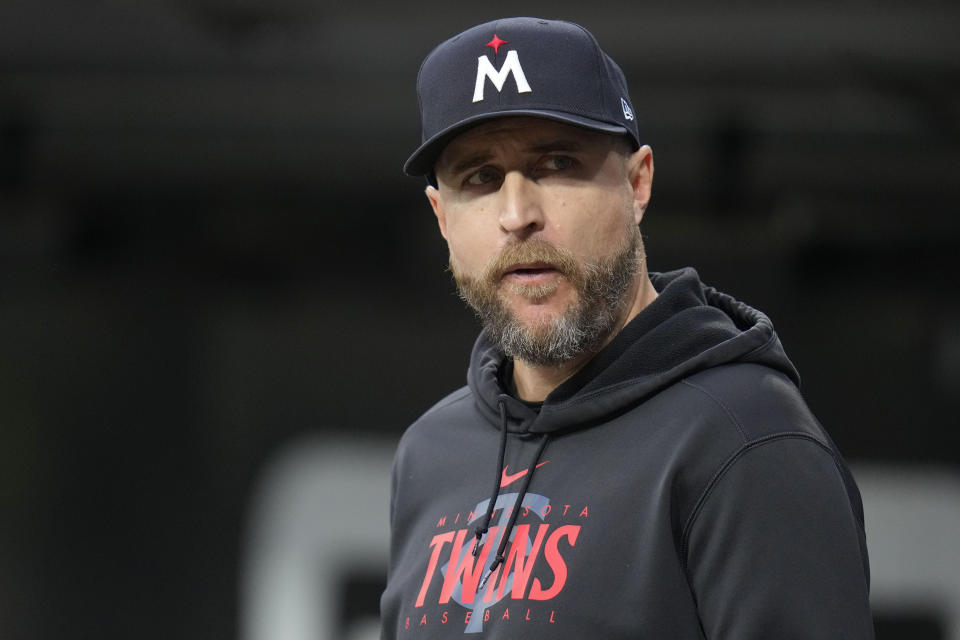 Minnesota Twins manager Rocco Baldelli watches from the dugout during the first inning of a baseball game against the Chicago White Sox, Saturday, Sept. 16, 2023, in Chicago. (AP Photo/Erin Hooley)