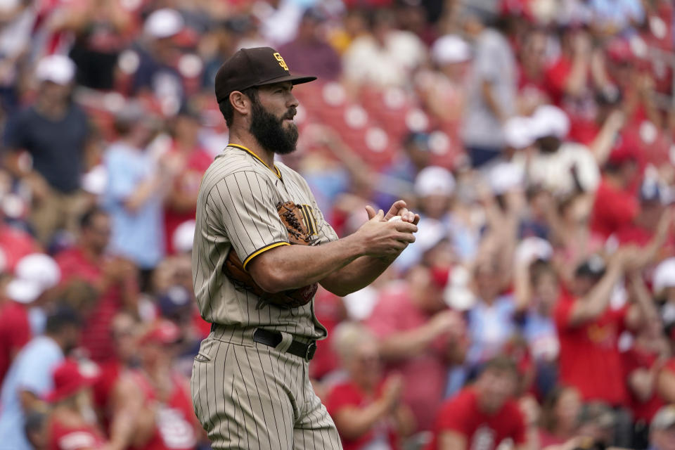 San Diego Padres starting pitcher Jake Arrieta pauses on the mound during the first inning of a baseball game against the St. Louis Cardinals Sunday, Sept. 19, 2021, in St. Louis. (AP Photo/Jeff Roberson)