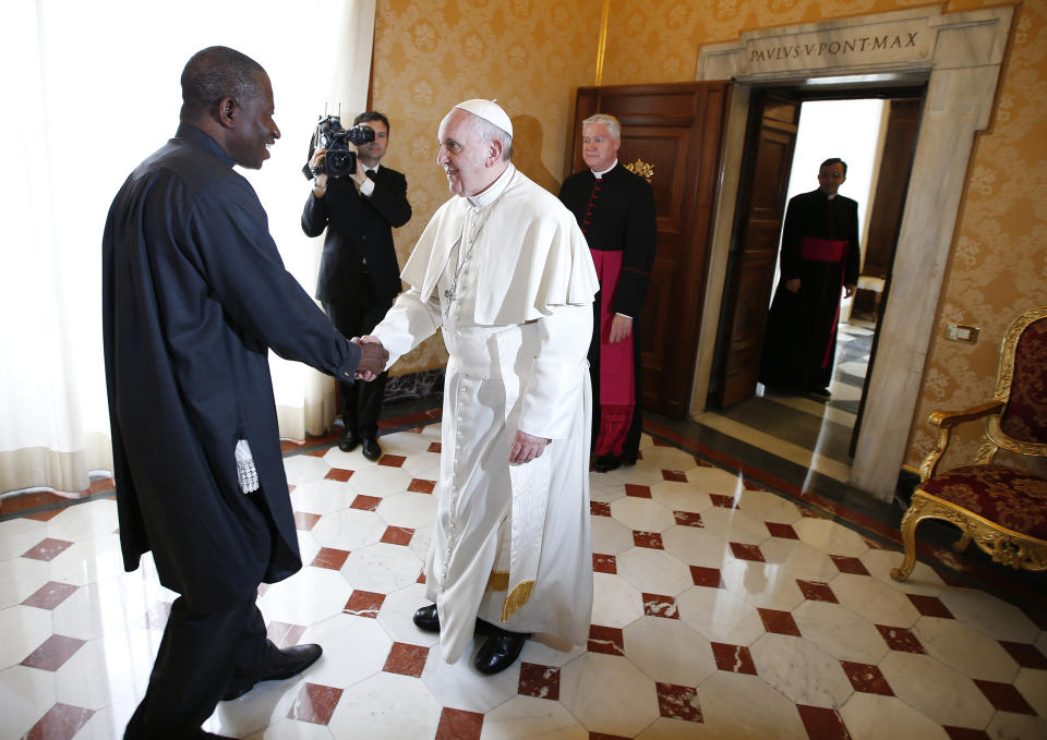 Pope Francis welcomes President Goodluck Jonathan during a private audience at the Vatican, Saturday, March 22, 2014. (AP Photo/Tony Gentile, Pool)