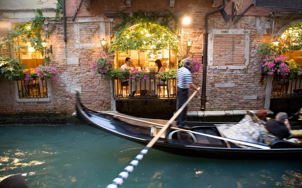 Dining is a central part of the Venice experience - Getty
