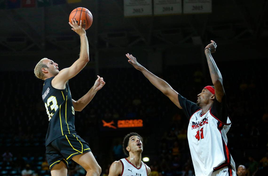 The Aftershocks’ Conner Frankamp takes a shot against the Air Raiders, a team of Texas Tech Alum, during the second round of The Basketball Tournament on Saturday night.
