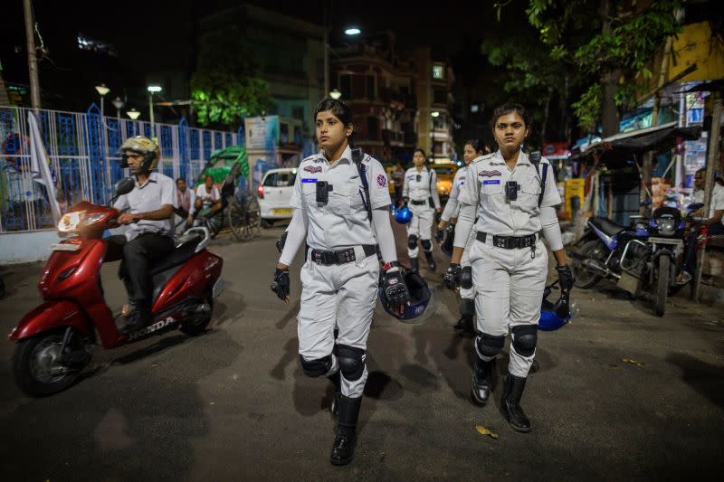 KOLKATA, WEST BENGAL, INDIA - 2019/03/12: The specially trained female police squad patrols the streets of Calcutta. Launched in July 2018, the team consists of twenty-four young female police officers who are getting ready to take on Calcutta's crime scene.