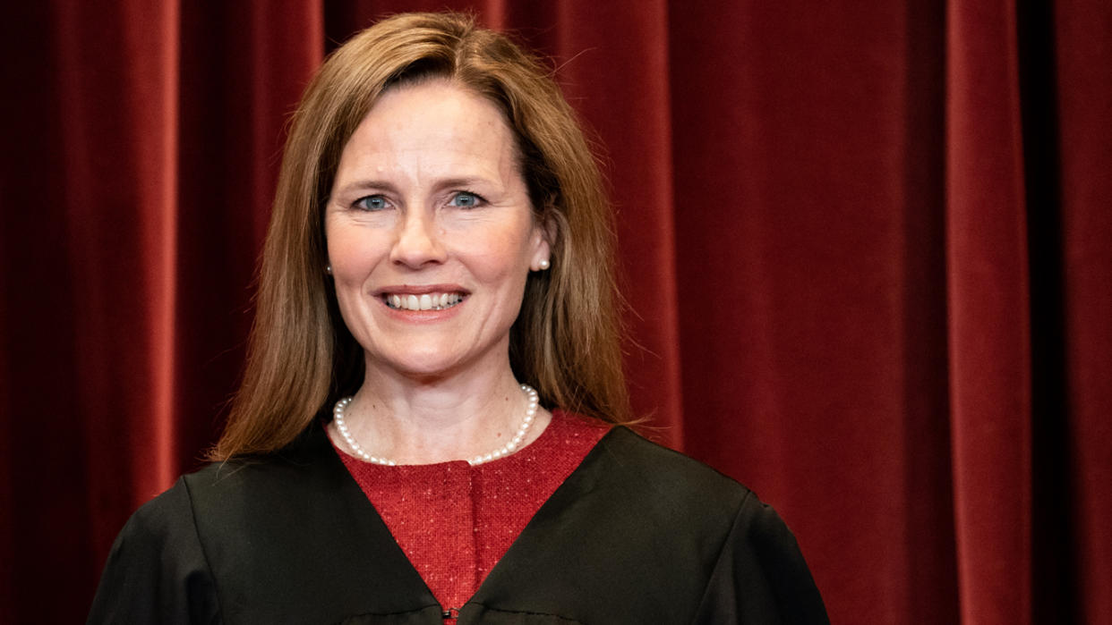 Justice Amy Coney Barrett poses for a group photo of the justices at the U.S. Supreme Court on April 23, 2021. (Erin Schaff-Pool/Getty Images)