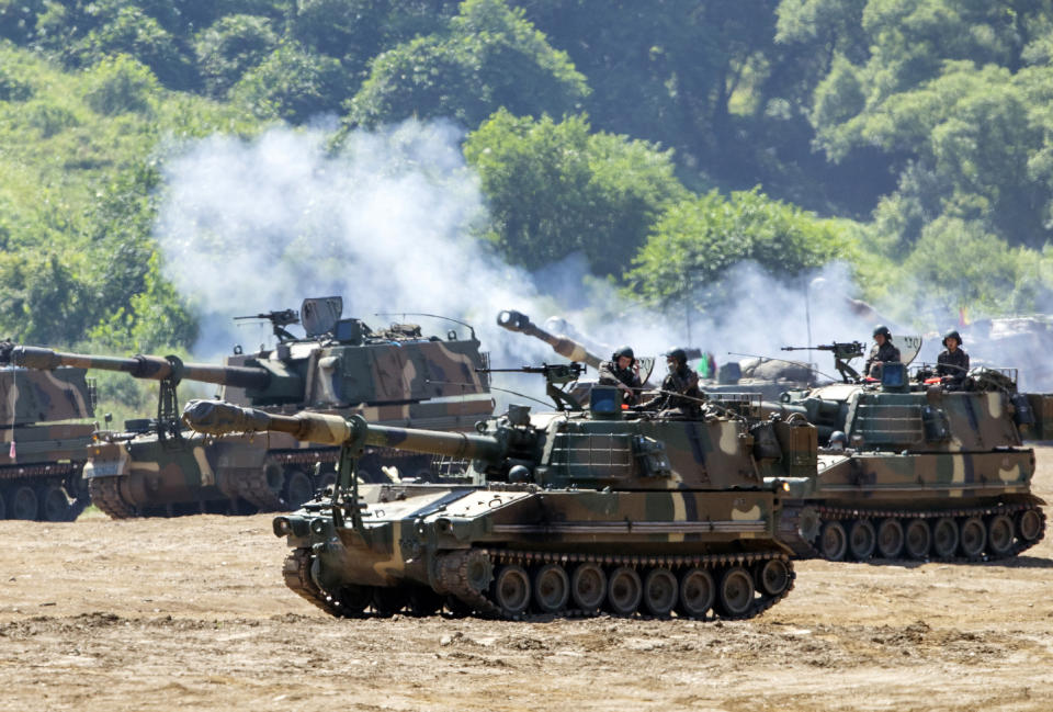 South Korean army's K-55 self-propelled howitzers fire during a military exercise in Paju, South Korea, near the border with North Korea, Monday, June 22, 2020. South Korea on Monday urged North Korea to scrap a plan to launch propaganda leaflets across the border, after the North said it’s ready to float more than 10 million leaflets in what would be the largest such physiological campaign against its southern rival.(Yun Dong-jin/Yonhap via AP)