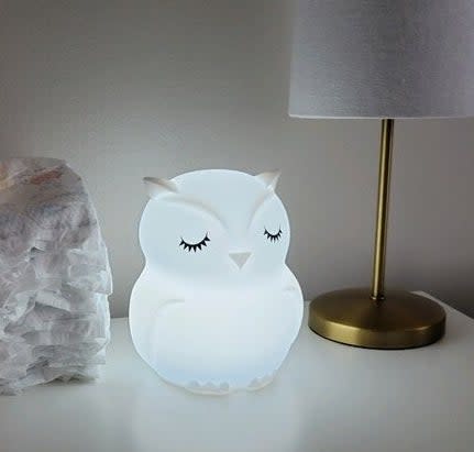 a reviewer of the white owl night-light in a nursery