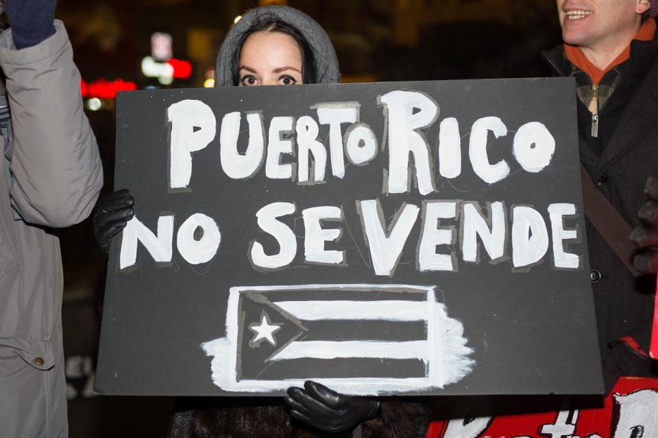 Demonstrators gather in Union Square, New York City 100 days after Hurricane Maria made landfall in Puerto Rico. It is estimated that more than 50% of the island is still without power. Hurricane Maria killed 64 Puerto Ricans. Approximately 1,000 more died as a result of poor disaster response. Protest over handling of Puerto Rico hurricane relief aid, New York, USA - 29 Dec 2017