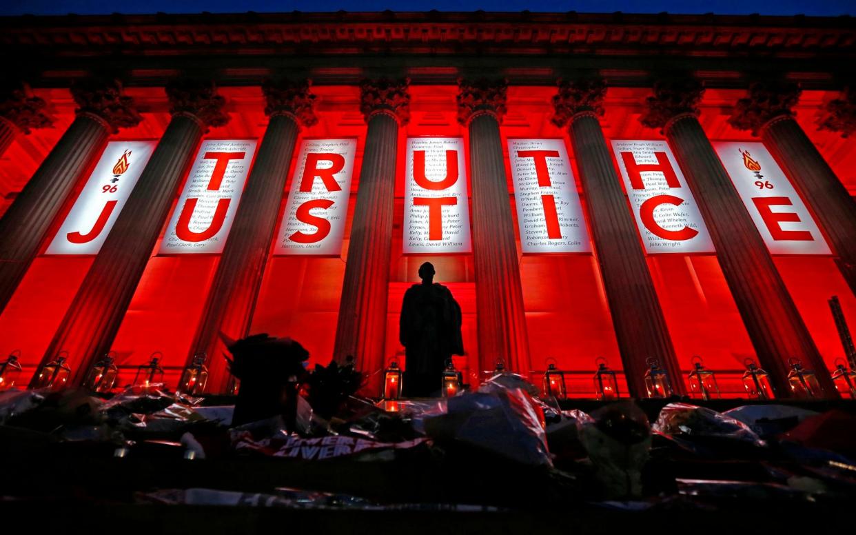 St George's Hall in Liverpool illuminated following a special commemorative service to mark the outcome of the Hillsborough inquest, which ruled that 96 Liverpool fans who died as a result of the Hillsborough disaster were unlawfully killed. - PA