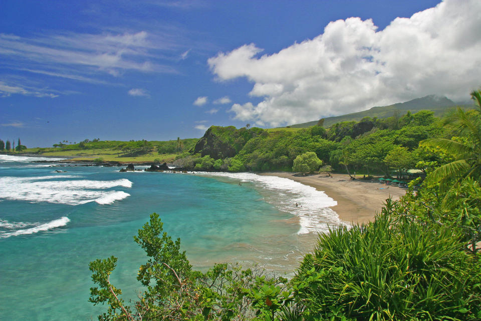 FILE - This undated file photo provided by Ron Dahlquist for the Maui Visitors Bureau shows Hamoa Beach in Maui, Hawaii. Hamoa Beach is fifth on the 2012 list of Top 10 Beaches produced annually by coastal expert Stephen P. Leatherman, also known as "Dr. Beach," director of Florida International University's Laboratory for Coastal Research. (AP Photo/MVB, Ron Dahlquist) MANDATORY CREDIT: MVB/RON DAHLQUIST. FOR EDITORIAL USE ONLY, NO SALES, ONE-TIME USE ONLY, NO ARCHIVES, FOR USE ONLY WITH TRAVEL STORY ON BEST BEACHES.