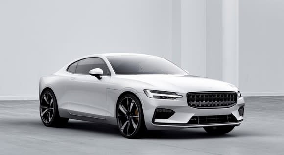 The Polestar 1, a white coupe with sporty wheels and tires and upright styling reminiscent of classic Volvos.